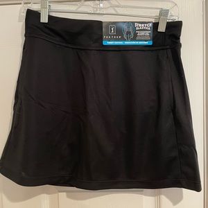 PGA Tour Skort.  New With Tags  Performance stretch fabric. Size Small. 15” long